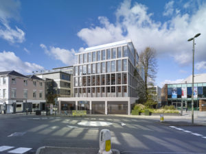 office building CGI Guildford roundabout sky clouds concrete mullion